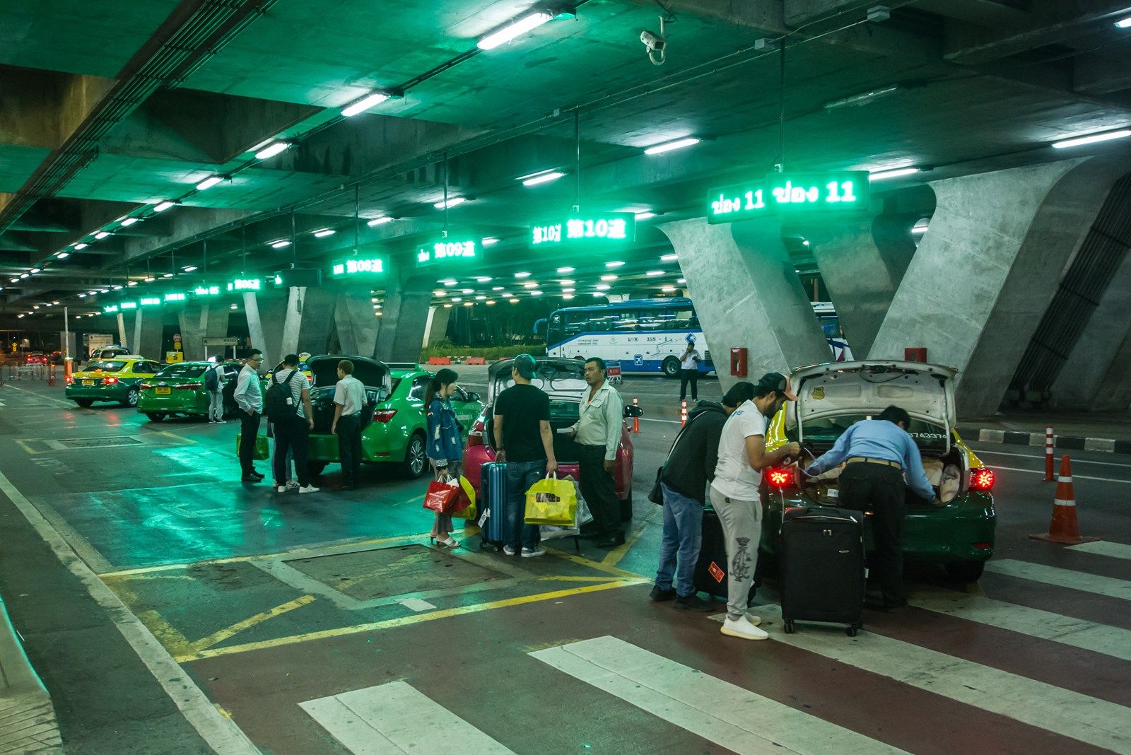 Bangkok airport taxi stand with taxis waiting for passengers